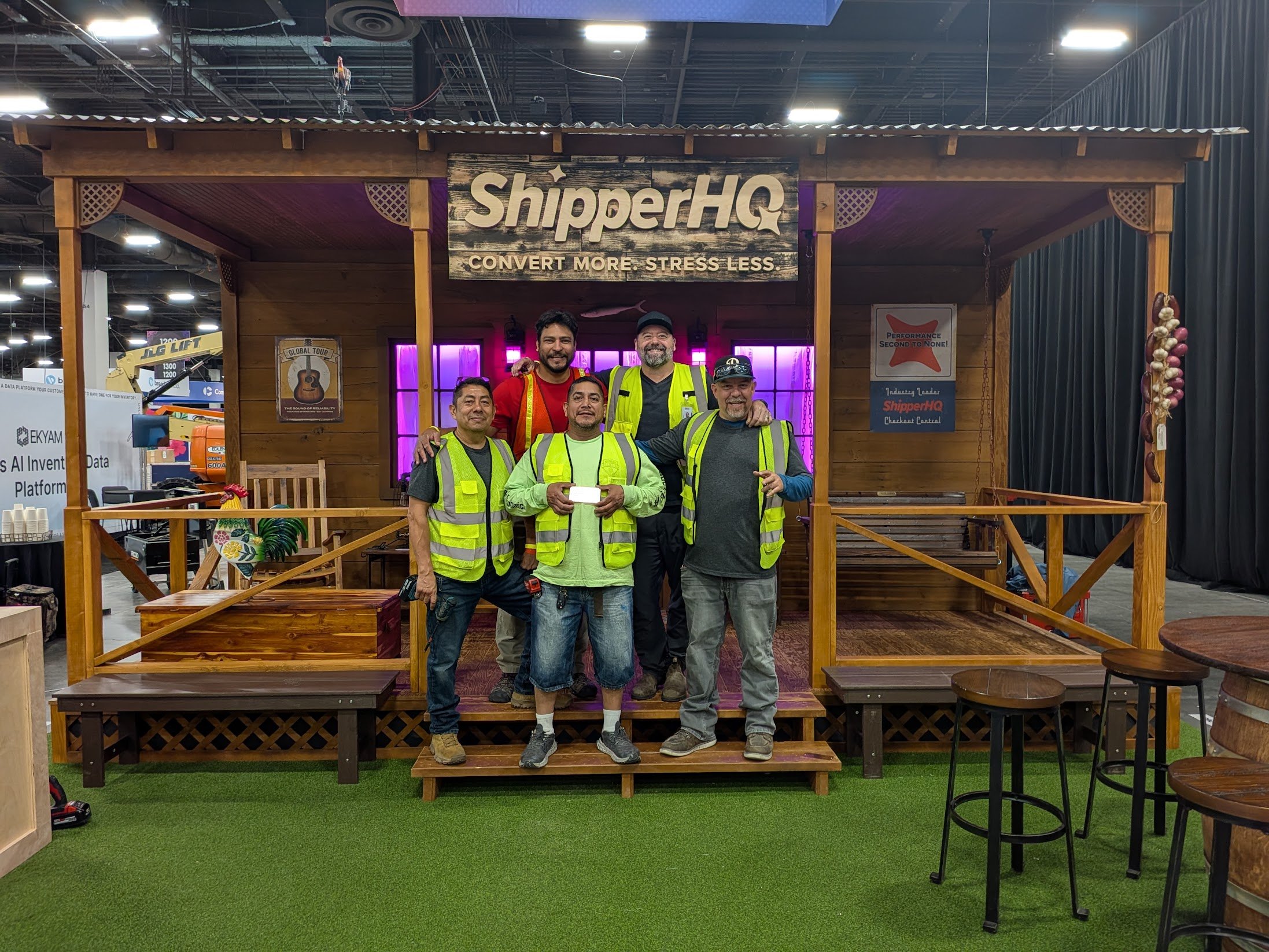 The guys that built the ShipperHQ booth in front of it